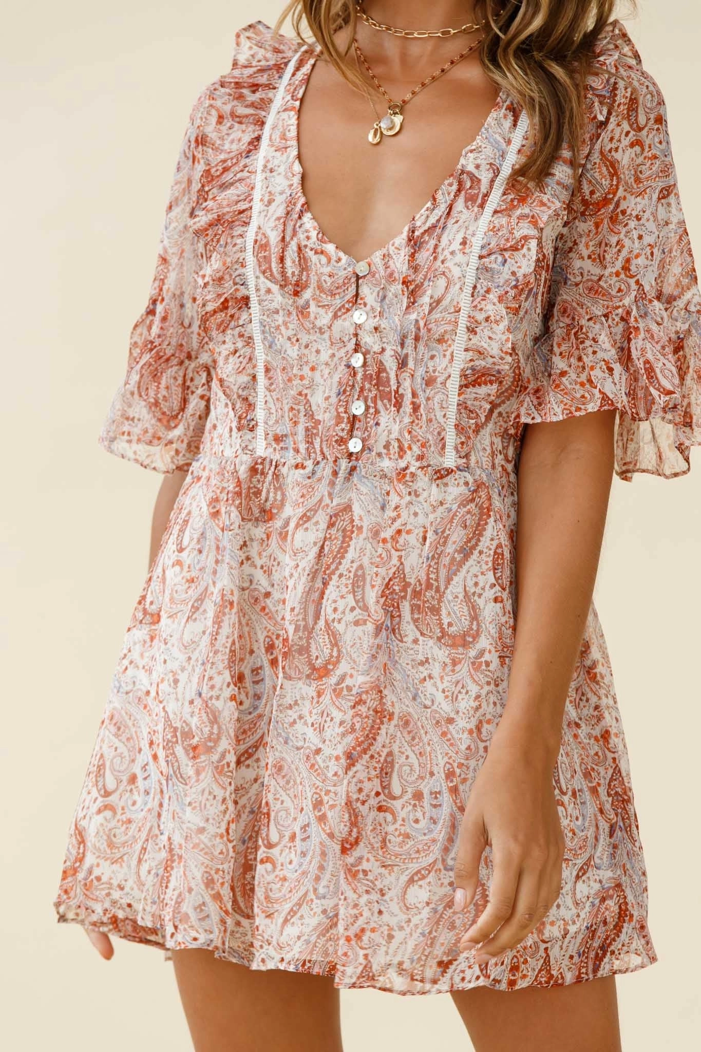 Zora Button Bodice Fluted Sleeve Dress Paisley Print Rust
